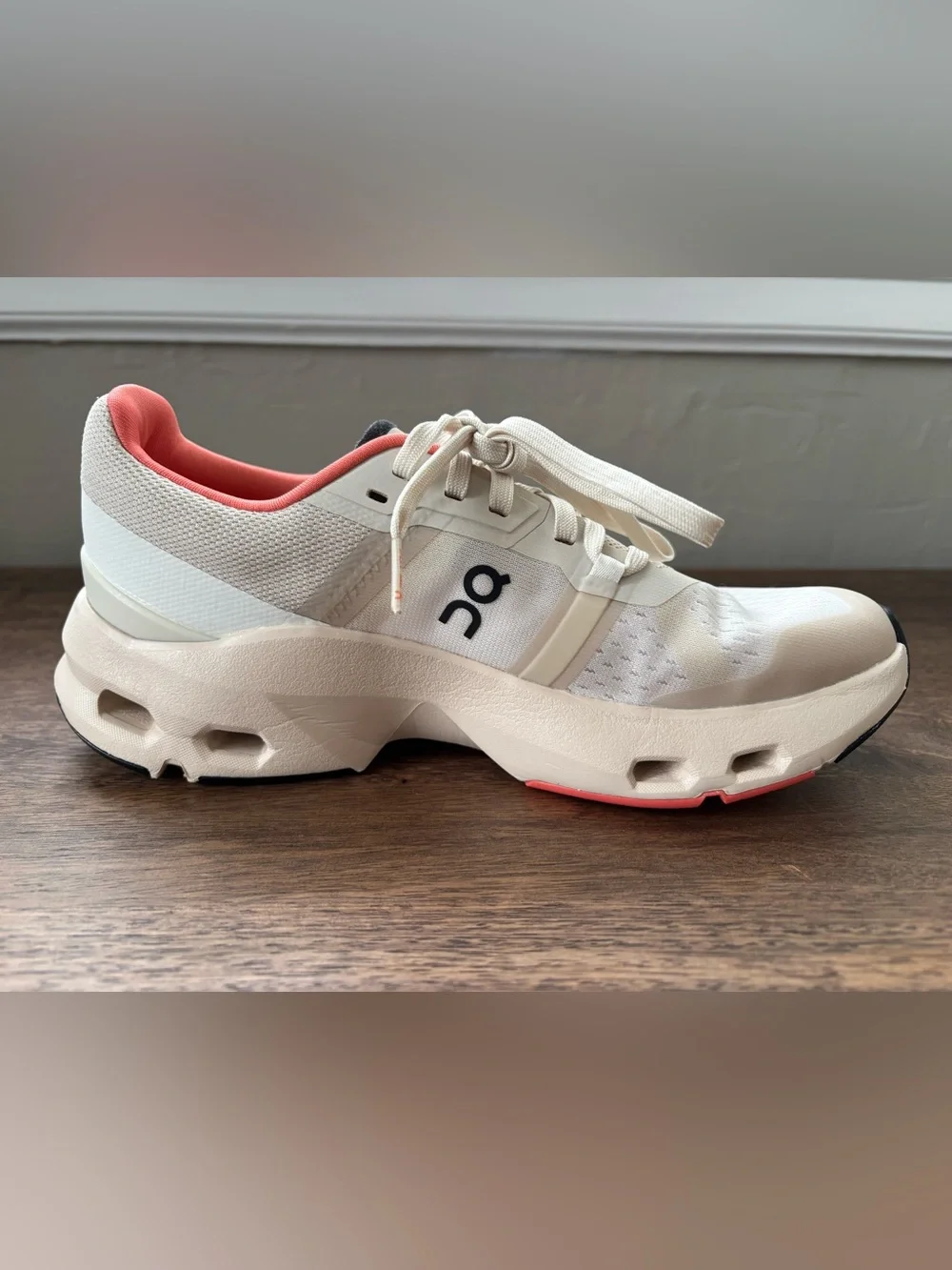 On Women's Cloudpulse Sneakers in Cream with Coral Lining